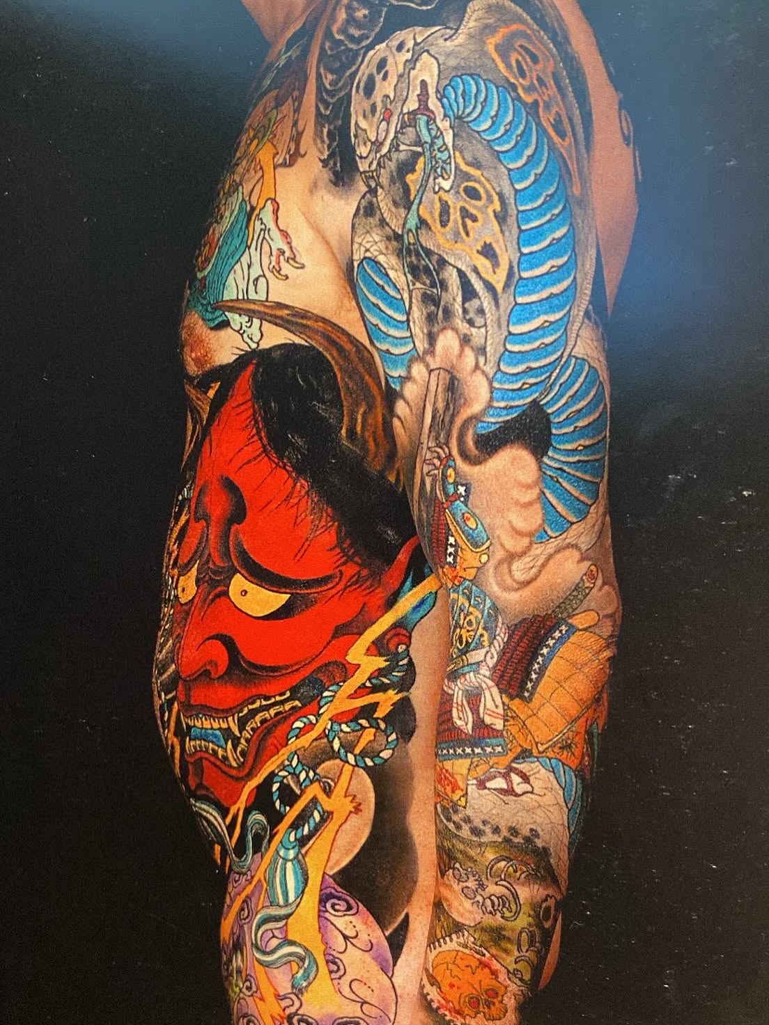 Tattoo artist Timothy Dywelska working in his Melbourne studio